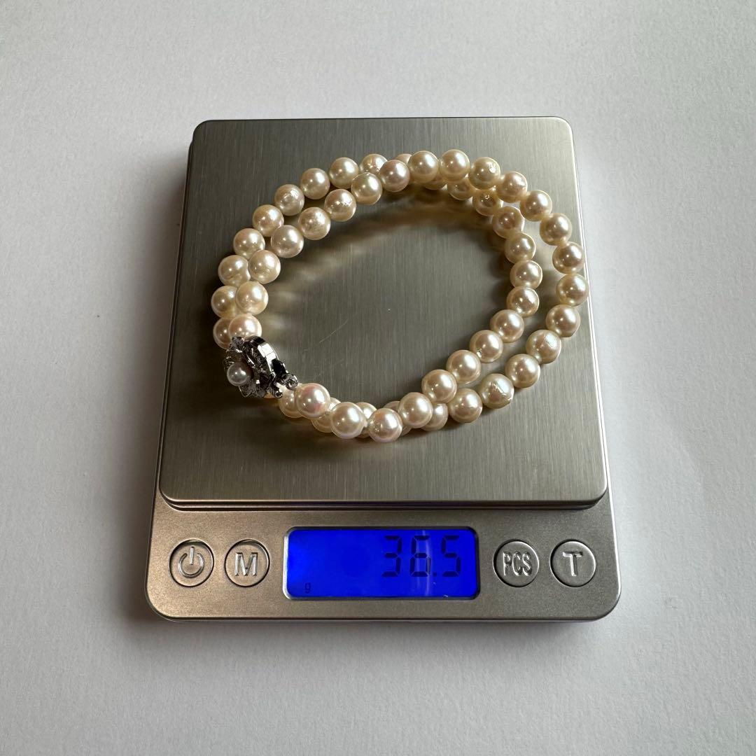 Akoya pearl necklace featuring approximately 7.8mm large white-based pearls