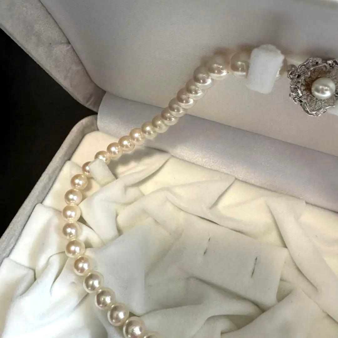 Akoya pearl necklace featuring approximately 7.8mm large white-based pearls