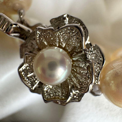 Akoya pearl necklace featuring approximately 7.8mm large white-based pearls