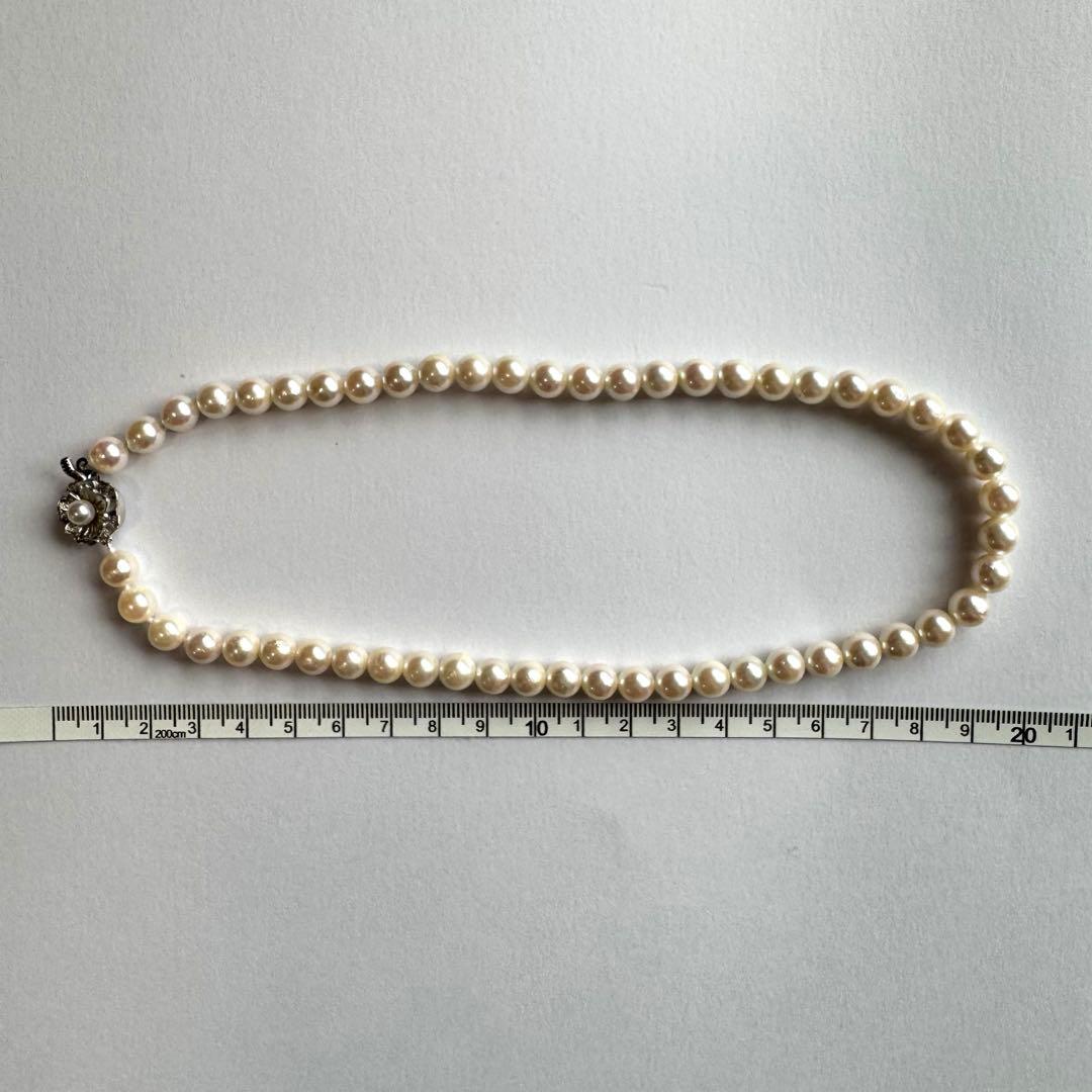 Akoya pearl necklace featuring approximately 7.8mm large white-based pearls