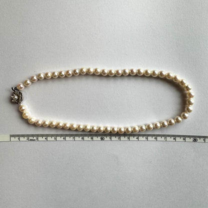 Akoya pearl necklace featuring approximately 7.8mm large white-based pearls