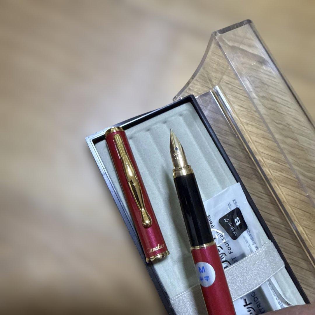 Discontinued Pilot Cavalier red ink pen with metal and plastic body