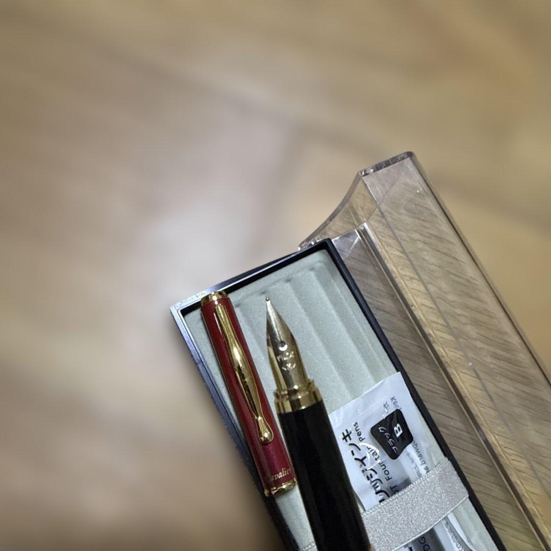Discontinued Pilot Cavalier red ink pen with metal and plastic body