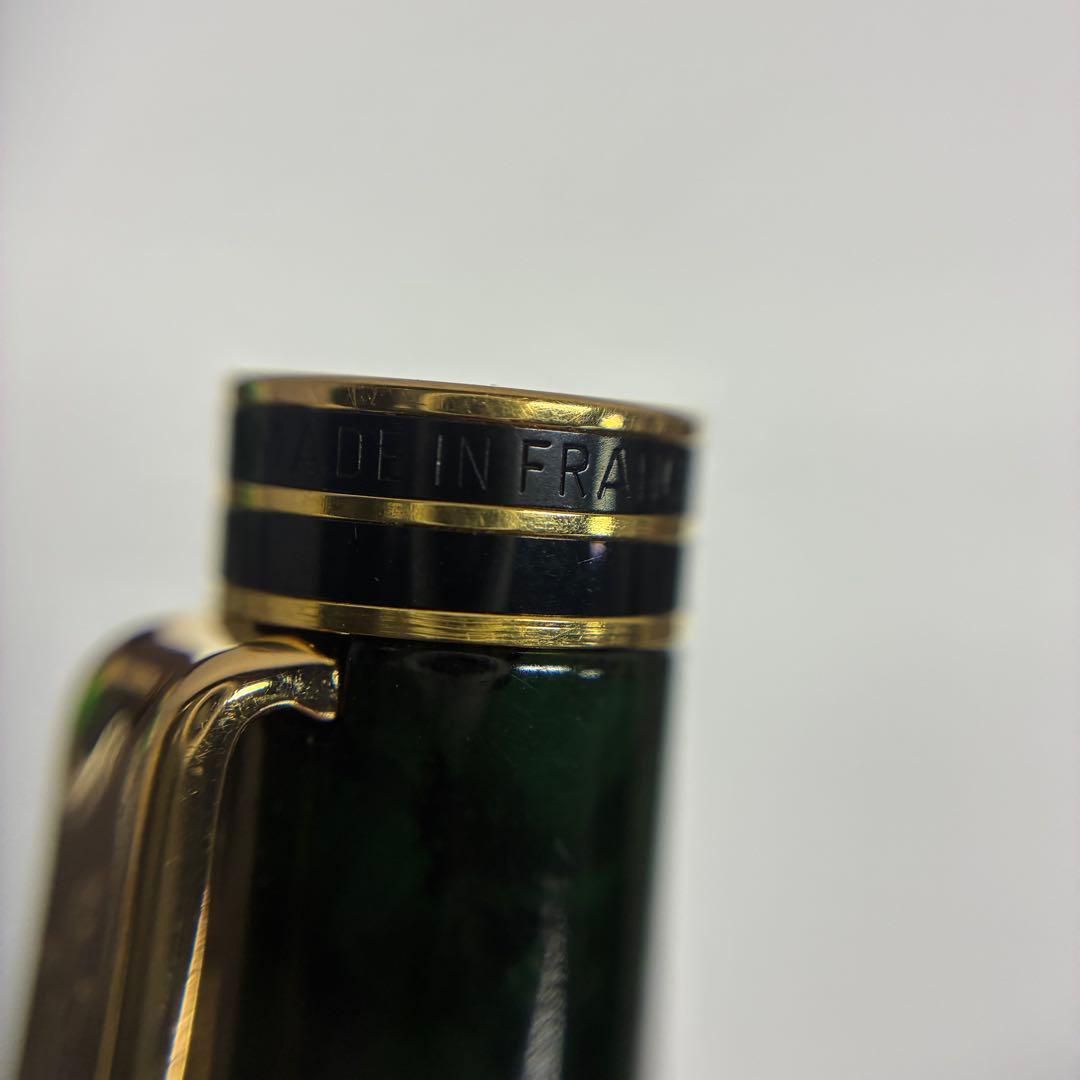 Waterman Exclusive Ballpoint Pen with green marble body, gold trim, and black textured grip
