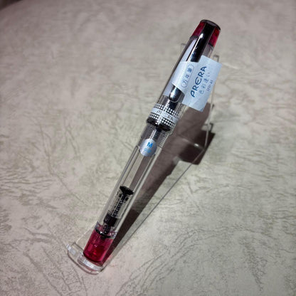 Pilot Prera fountain pen with medium nib in translucent red color, shown without accessories