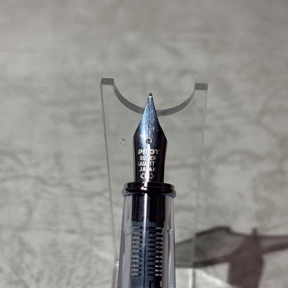 Pilot Prera fountain pen with medium nib in translucent red color, shown without accessories