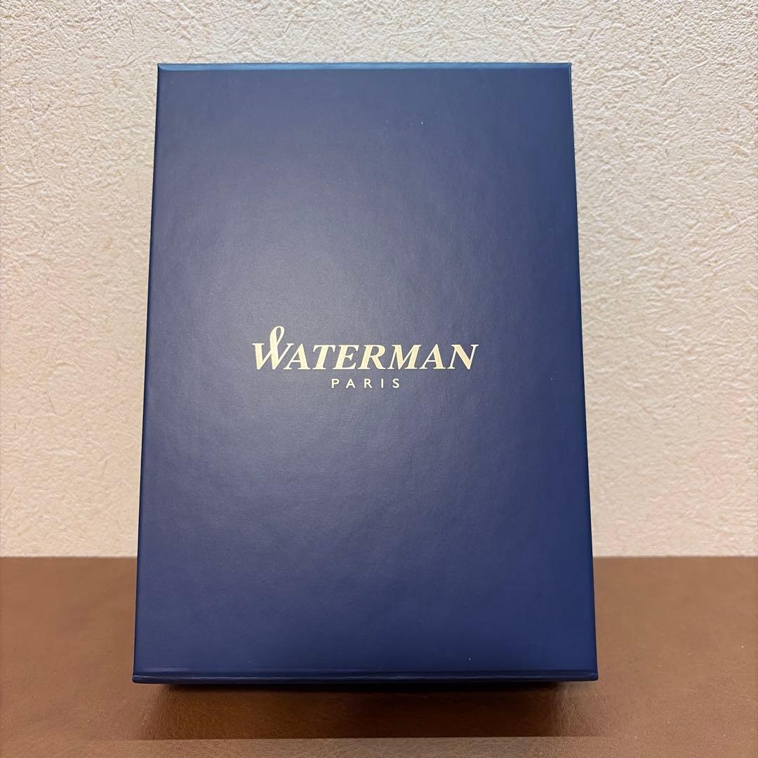 WATERMAN Expert Matte Black ballpoint pen with metal body and leather grip shown with included case