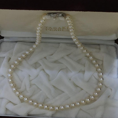 TASAKI Akoya pearl necklace 6.5-6.9mm pearls with SV clasp displayed on a white background