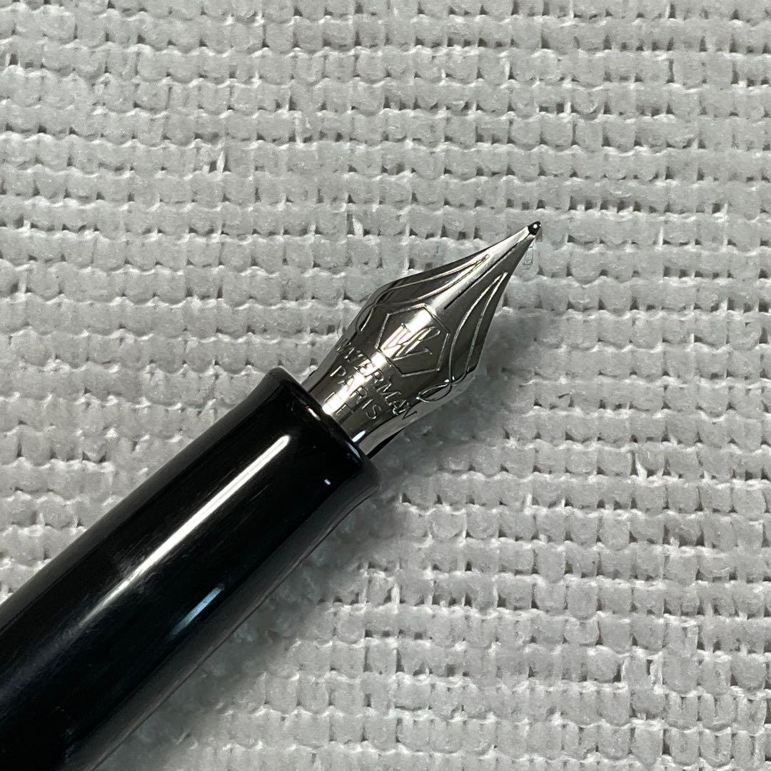 WATERMAN fountain pen with converter and black pen case holding three writing instruments