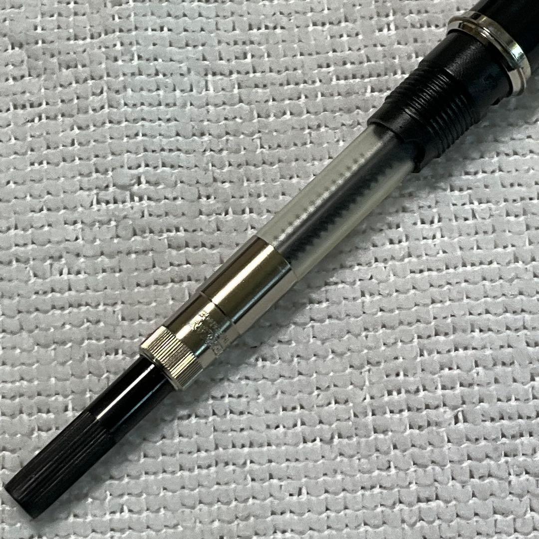 WATERMAN fountain pen with converter and black pen case holding three writing instruments