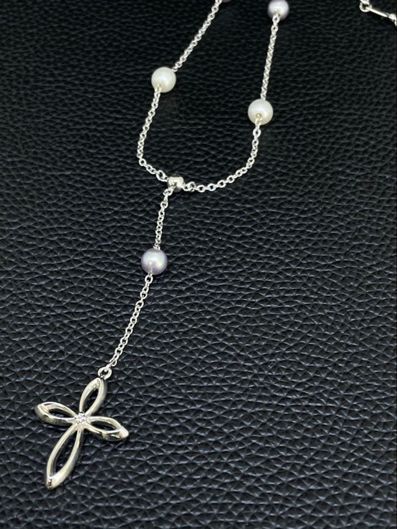 Tasaki Pearl Y-shape Cross Necklace in silver and white with a 41 cm chain on a white background