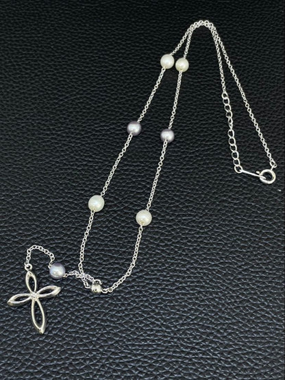 Tasaki Pearl Y-shape Cross Necklace in silver and white with a 41 cm chain on a white background