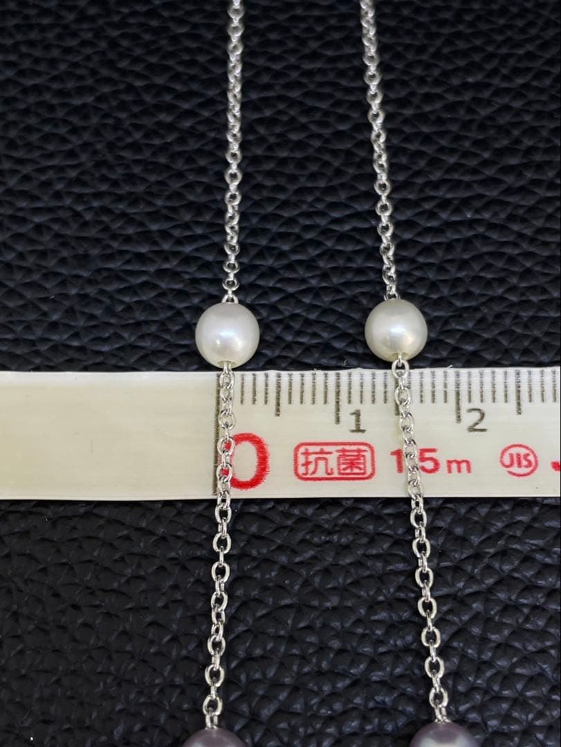 Tasaki Pearl Y-shape Cross Necklace in silver and white with a 41 cm chain on a white background