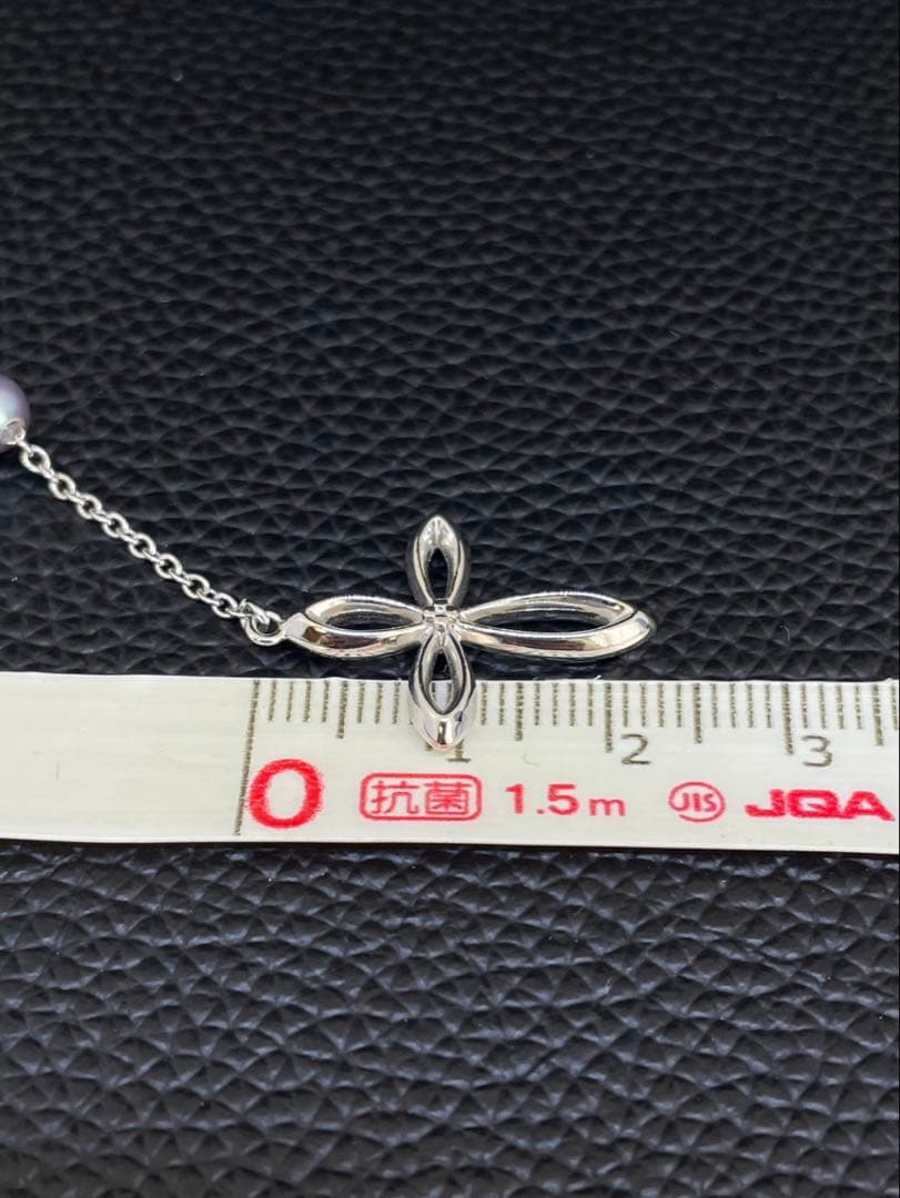 Tasaki Pearl Y-shape Cross Necklace in silver and white with a 41 cm chain on a white background