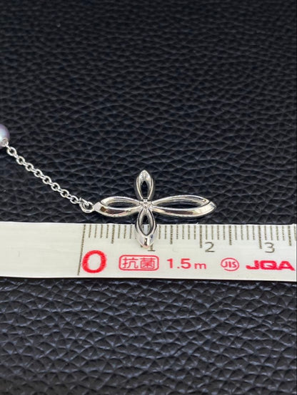 Tasaki Pearl Y-shape Cross Necklace in silver and white with a 41 cm chain on a white background