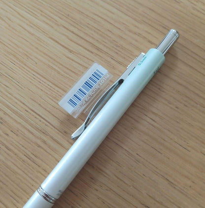 Pilot Melty 2+1 multi-function swing-type pen with black and red ballpoint tips and green 0.5mm mechanical pencil barrel