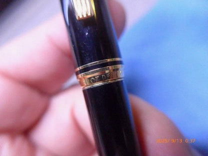 Pilot Deluxe fountain pen with 14K gold nib, black metal body, and gold-plated clip and ring