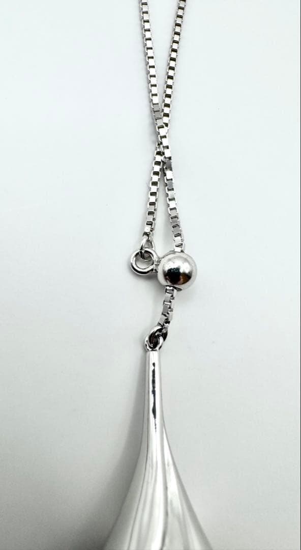 Tasaki SV Black Bird of Paradise necklace featuring a 10.8mm peacock color pearl on a 45cm chain