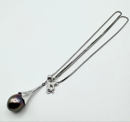 Tasaki SV Black Bird of Paradise necklace featuring a 10.8mm peacock color pearl on a 45cm chain