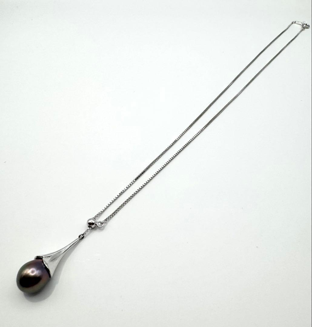 Tasaki SV Black Bird of Paradise necklace featuring a 10.8mm peacock color pearl on a 45cm chain