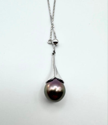 Tasaki SV Black Bird of Paradise necklace featuring a 10.8mm peacock color pearl on a 45cm chain