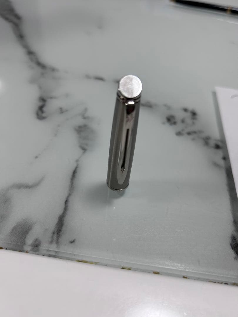 Waterman Hemisphere ballpoint and rollerball pen with stainless steel body engraved France and WATERMAN