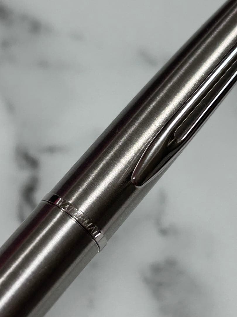 Waterman Hemisphere ballpoint and rollerball pen with stainless steel body engraved France and WATERMAN