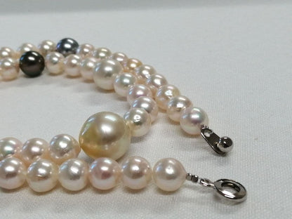 Law necklace featuring 9.5-9 mm South Sea white and Tahitian black baroque pearls on a 54 cm strand