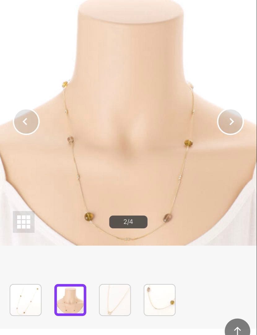 Agat K10 necklace with smoky quartz pendant displayed on white background with certificate and fabric pouch