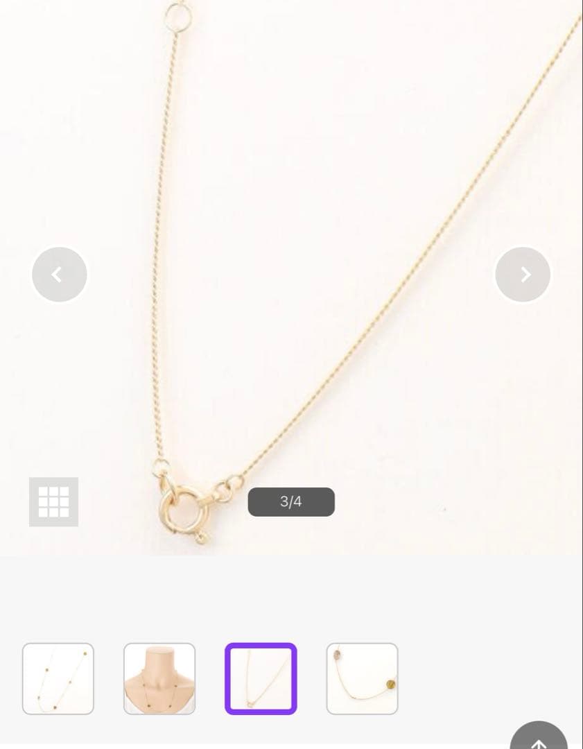 Agat K10 necklace with smoky quartz pendant displayed on white background with certificate and fabric pouch