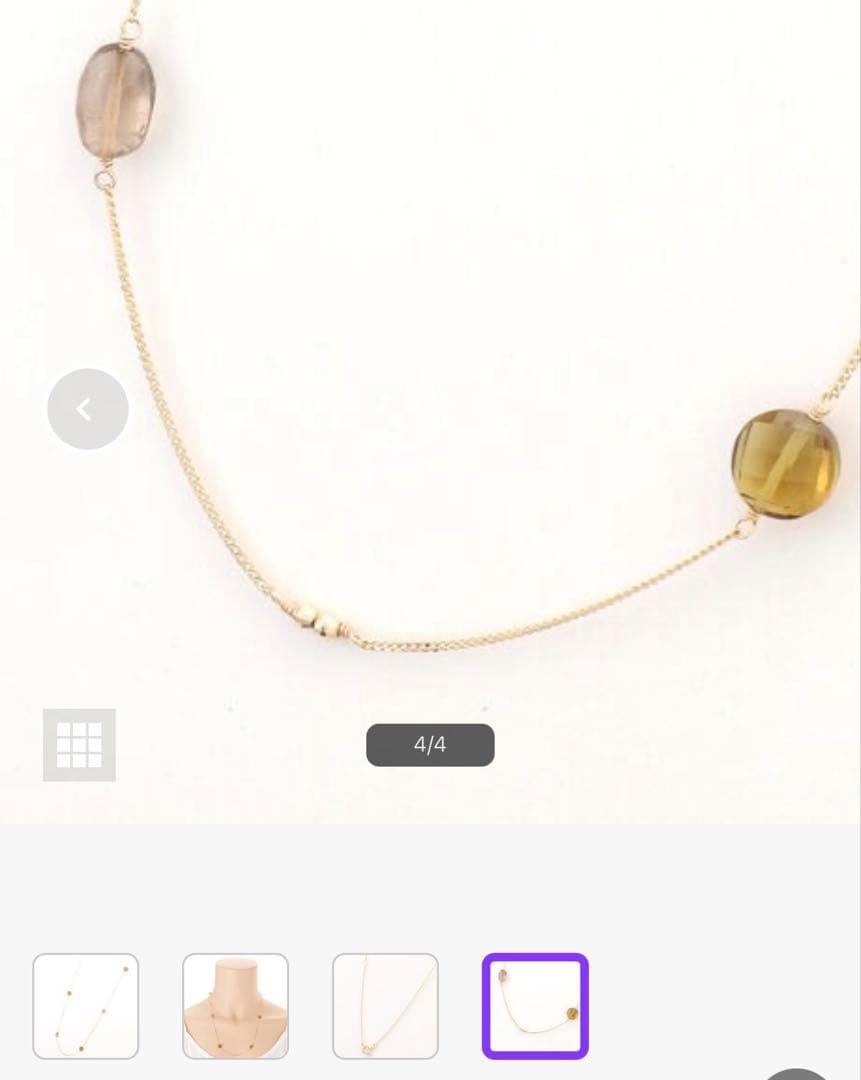 Agat K10 necklace with smoky quartz pendant displayed on white background with certificate and fabric pouch