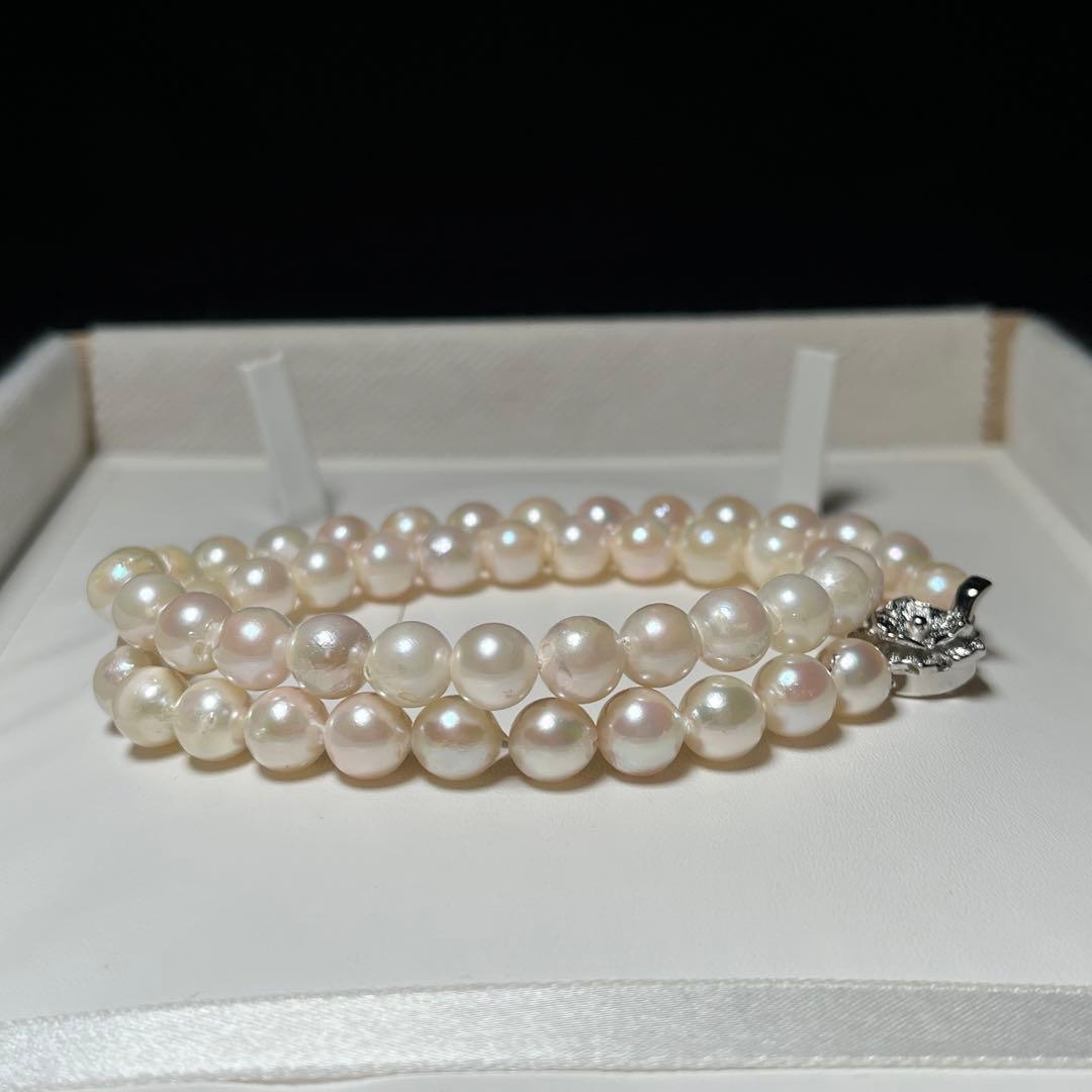 Akoya pearl necklace with round white pearls sized 7.7-7.9mm on a 43cm silver chain