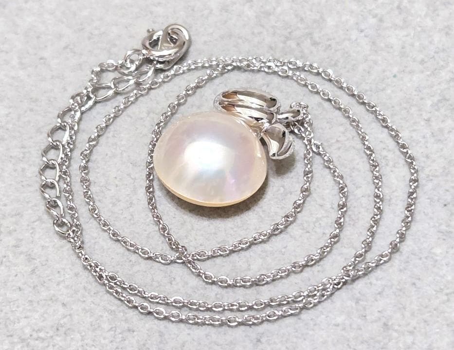 Tasaki Pearl Mabe Pearl silver necklace with a 42cm chain and detailed top shown