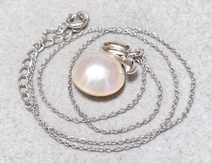 Tasaki Pearl Mabe Pearl silver necklace with a 42cm chain and detailed top shown