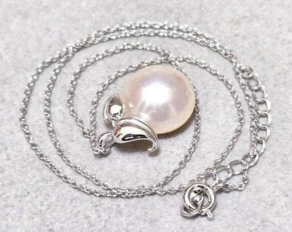 Tasaki Pearl Mabe Pearl silver necklace with a 42cm chain and detailed top shown