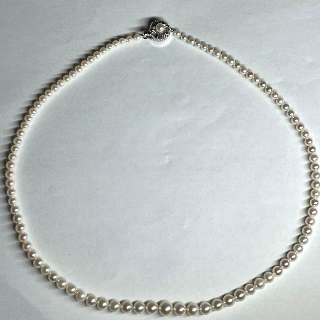 Akoya pearl necklace featuring gradation pearls sized 3.3-6.9mm on a 45cm strand with certificate