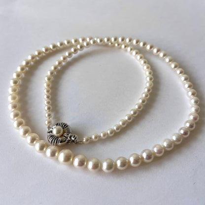 Akoya pearl necklace featuring gradation pearls sized 3.3-6.9mm on a 45cm strand with certificate