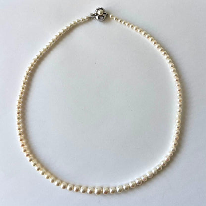 Akoya pearl necklace featuring gradation pearls sized 3.3-6.9mm on a 45cm strand with certificate