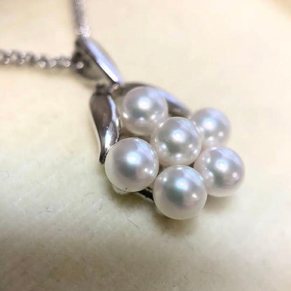 Mikimoto Akoya pearl flower necklace with silver chain and 15x13 mm flower-shaped pendant