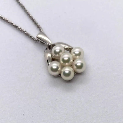 Mikimoto Akoya pearl flower necklace with silver chain and 15x13 mm flower-shaped pendant