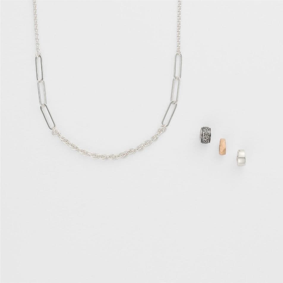 Agete 2025 Limited Edition Silver Necklace Set with three silver, gold, and black plated charms