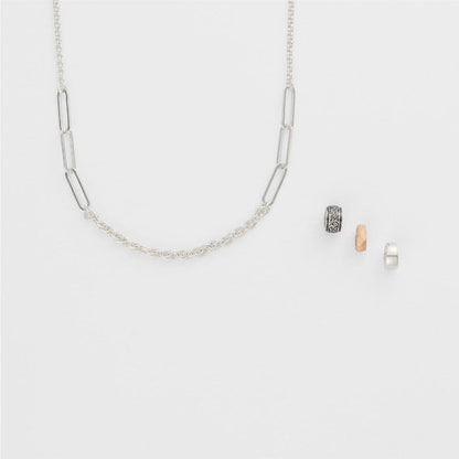 Agete 2025 Limited Edition Silver Necklace Set with three silver, gold, and black plated charms
