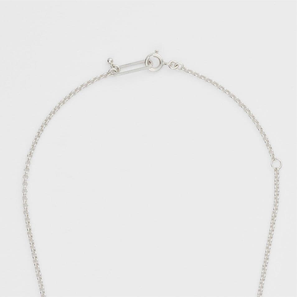 Agete 2025 Limited Edition Silver Necklace Set with three silver, gold, and black plated charms