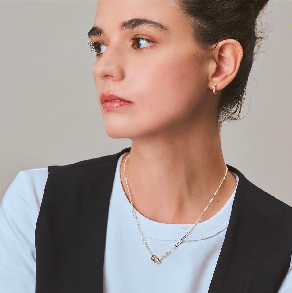 Agete 2025 Limited Edition Silver Necklace Set with three silver, gold, and black plated charms