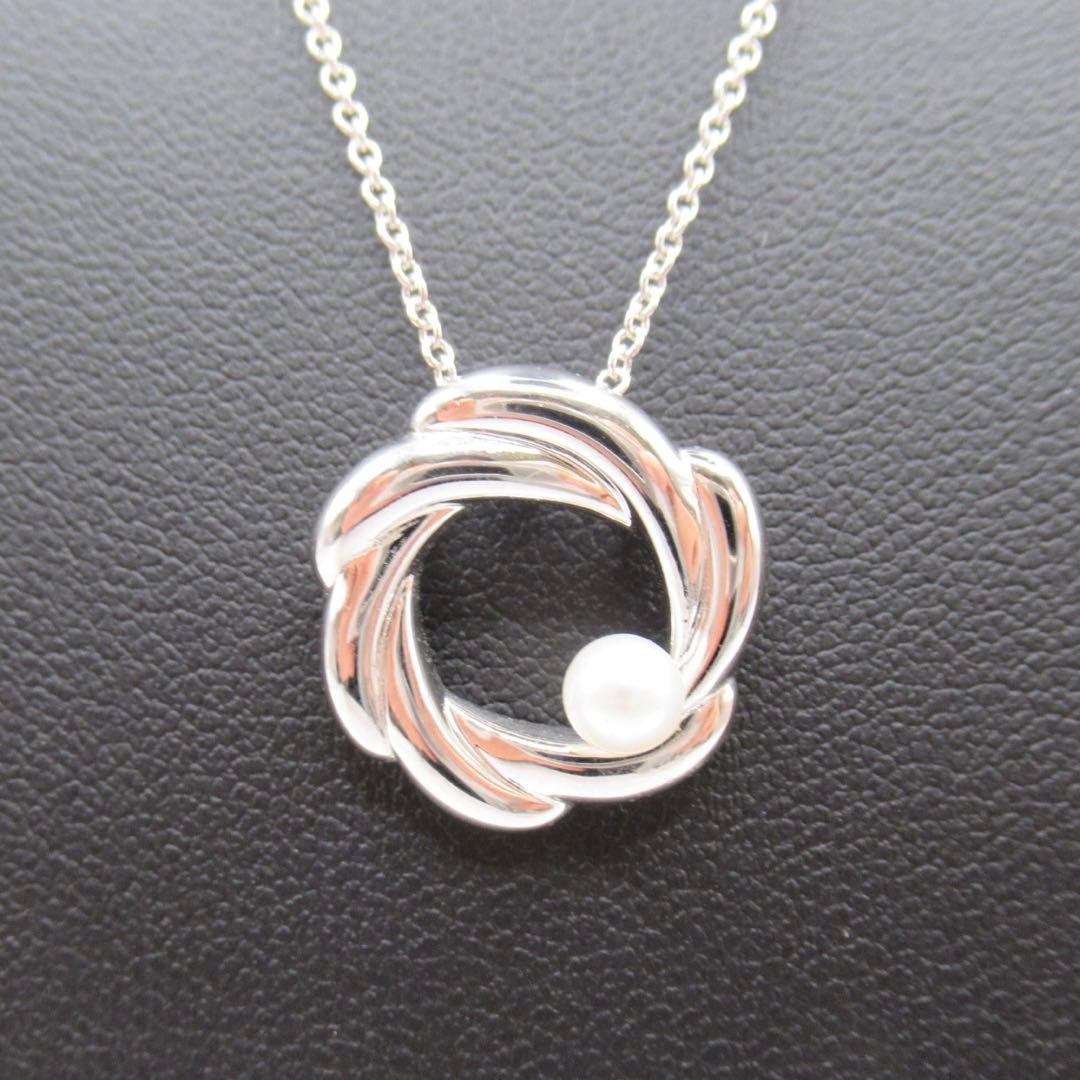 TASAKI Pearl Necklace Circle SUN featuring single pearl on 42 cm silver chain with pendant marked TASAKI