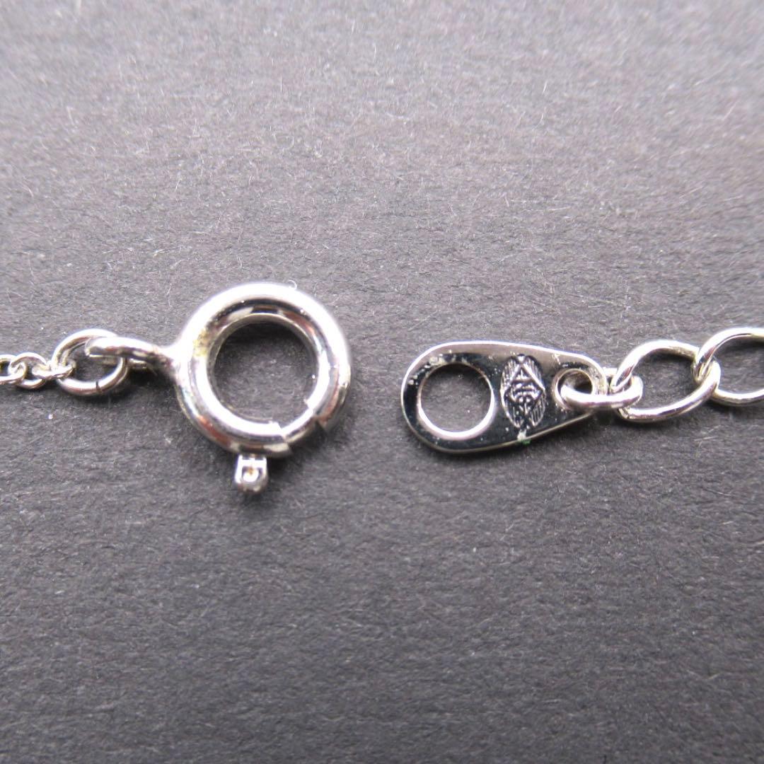 TASAKI Pearl Necklace Circle SUN featuring single pearl on 42 cm silver chain with pendant marked TASAKI