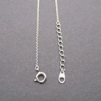 TASAKI Pearl Necklace Circle SUN featuring single pearl on 42 cm silver chain with pendant marked TASAKI