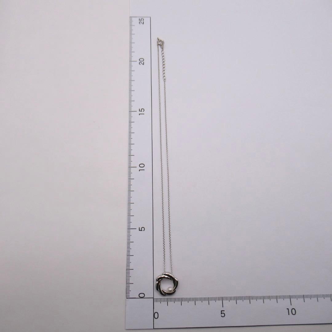 TASAKI Pearl Necklace Circle SUN featuring single pearl on 42 cm silver chain with pendant marked TASAKI