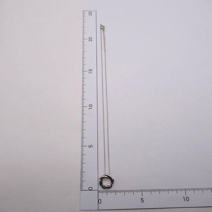 TASAKI Pearl Necklace Circle SUN featuring single pearl on 42 cm silver chain with pendant marked TASAKI