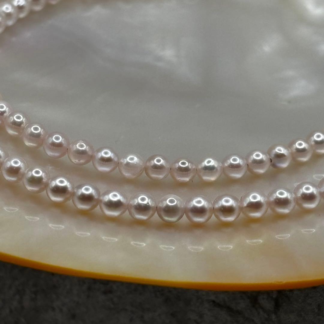 Akoya Pearl Pink Baby Pearl Necklace with white pink 3.5-4 mm pearls and 925 clasp on white background
